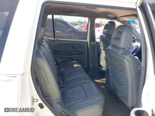 2004 Honda Pilot EX with VIN 5FNYF186X4B010171, listed as a IAAI auction lot 41999030 with 276,311 mi miles. Bid and sale history available at carsss.com. Image 8.