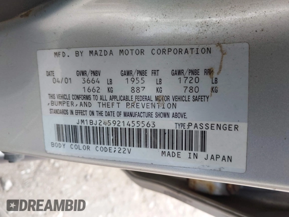 2002 Mazda Protege with VIN JM1BJ245921455563, listed as a IAAI auction lot 42064853 with Not Provided miles and . Bid and sale history available at DreamBid. Image 9.
