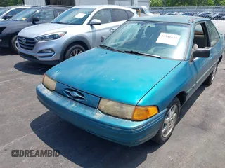 1994 Ford Escort z VIN 1FARP11J7RW270259, wystawiony jako IAAI lot #42341647 z przebiegiem 74 472 mil mil oraz . Historia ofert i sprzedaży dostępna na DreamBid. Obrazek 2.