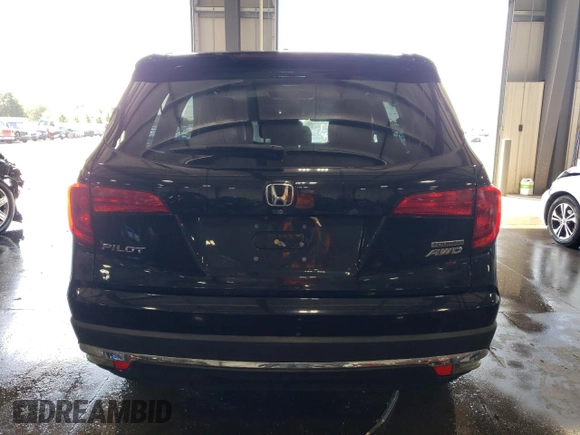 2017 Honda Pilot Touring with VIN 5FNYF6H97HB036935, listed as a Copart auction lot 71757334 with 68,641 mi miles and Salvage Title. Bid and sale history available at DreamBid. Image 6.