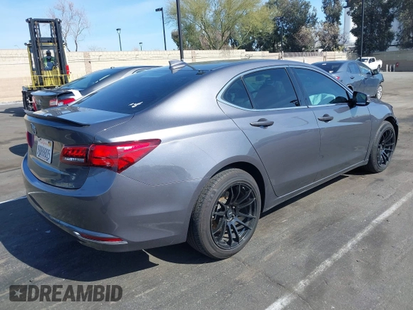 2017 Acura TLX V6 w/Technology Pkg with VIN 19UUB2F52HA004990, listed as a IAAI auction lot 41613435 with 120,186 mi miles. Bid and sale history available at carsss.com. Image 4.