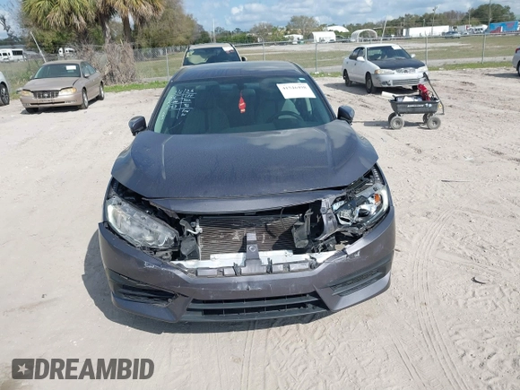 2017 Honda Civic LX with VIN 19XFC2F51HE036153, listed as a IAAI auction lot 41546498 with 78,726 mi miles and . Bid and sale history available at DreamBid. Image 17.
