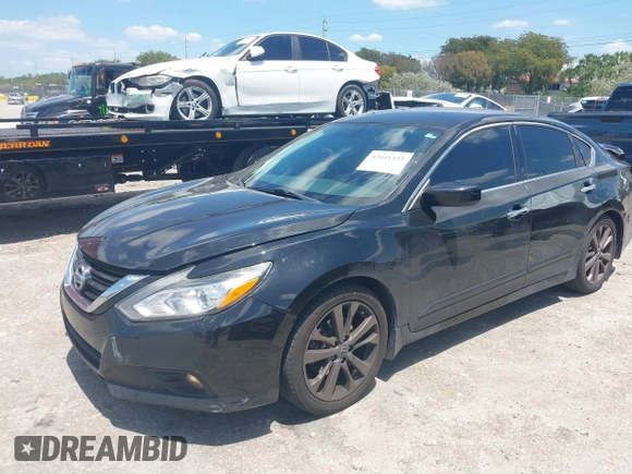 2018 Nissan Altima SV with VIN 1N4AL3AP8JC259494, listed as a IAAI auction lot 42041433 with 150,970 mi miles and . Bid and sale history available at DreamBid. Image 2.