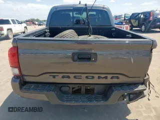 2021 Toyota Tacoma SR with VIN 3TYAX5GN8MT018185, listed as a Copart auction lot 59977895 with 68,149 mi miles and Salvage title. Bid and sale history available at DreamBid. Image 6.