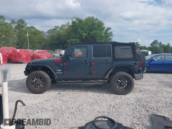 2007 Jeep Wrangler Unlimited Sahara with VIN 1J4GB59167L221686, listed as a IAAI auction lot 42473996 with 151,065 mi miles and . Bid and sale history available at DreamBid. Image 14.