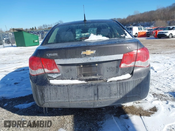 2014 Chevrolet Cruze 1LT z VIN 1G1PC5SB0E7419345, wystawiony jako IAAI lot #41412379 z przebiegiem 114 282 mil mil oraz . Historia ofert i sprzedaży dostępna na DreamBid. Obrazek 16.
