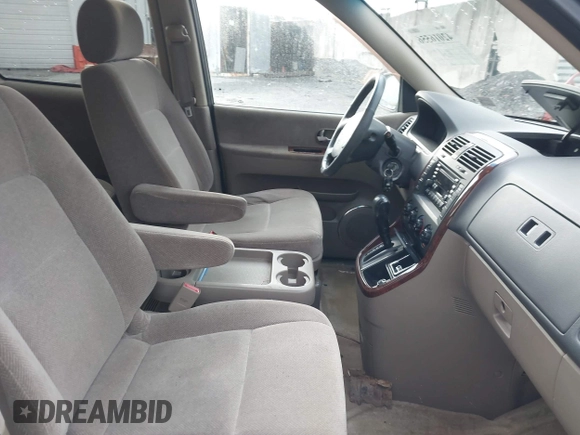 2003 Kia Sedona LX with VIN KNDUP131636378834, listed as a IAAI auction lot 42016556 with 88,751 mi miles and . Bid and sale history available at DreamBid. Image 5.