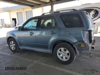 2010 Ford Escape Hybrid with VIN 1FMCU4K32AKB06645, listed as a Copart auction lot 63124055 with 162,646 mi miles and Salvage title. Bid and sale history available at DreamBid. Image 2.
