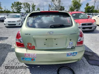 2007 Hyundai Accent SE z VIN KMHCN36C07U035170, wystawiony jako Copart lot #58201395 z przebiegiem 154 388 mil mil oraz Szkoda całkowita • Salvage title. Historia ofert i sprzedaży dostępna na DreamBid. Obrazek 6.
