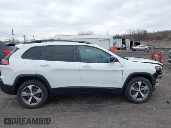 2022 Jeep Cherokee Limited with VIN 1C4PJMDX6ND550698, listed as a IAAI auction lot 41238598 with 18,006 mi miles and . Bid and sale history available at DreamBid. Image 13.