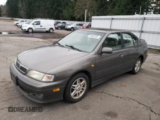 2000 Infiniti G20 Luxury z VIN JNKCP11A5YT303404, wystawiony jako Copart lot #82801234 z przebiegiem 178 185 mil mil oraz Tytuł czysty. Historia ofert i sprzedaży dostępna na DreamBid. Obrazek 1.