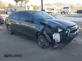 2021 Kia Forte LXS z VIN 3KPF24AD0ME329971, wystawiony jako IAAI lot #42310912 z przebiegiem 37 934 mil mil oraz . Historia ofert i sprzedaży dostępna na DreamBid. Obrazek 1.