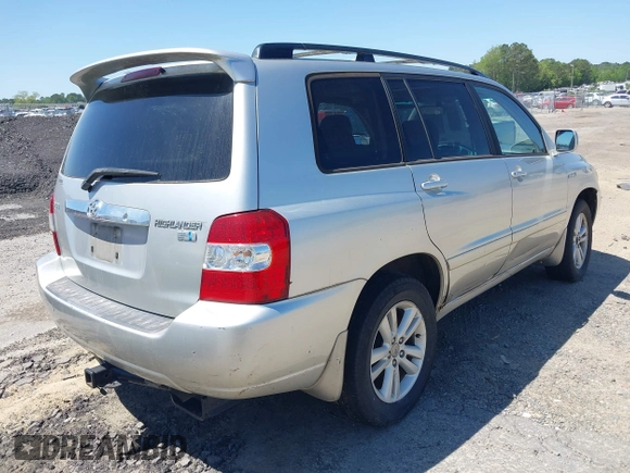 2006 Toyota Highlander Hybrid with VIN JTEDW21A060015086, listed as a IAAI auction lot 42138780 with 228,472 mi miles. Bid and sale history available at carsss.com. Image 4.