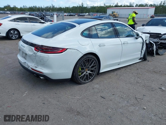 2018 Porsche Panamera 4 E-Hybrid with VIN WP0AE2A74JL130540, listed as a IAAI auction lot 42078444 with 65,981 mi miles and . Bid and sale history available at DreamBid. Image 4.
