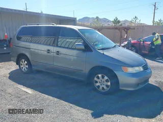 2002 Honda Odyssey EX-L z VIN 5FNRL18012B036003, wystawiony jako IAAI lot #42205950 z przebiegiem 252 885 mil mil oraz . Historia ofert i sprzedaży dostępna na DreamBid. Obrazek 1.