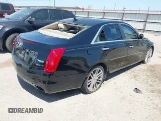 2014 Cadillac CTS Luxury RWD with VIN 1G6AR5SX4E0195791, listed as a IAAI auction lot 42004960 with Not Provided miles. Bid and sale history available at carsss.com. Image 4.