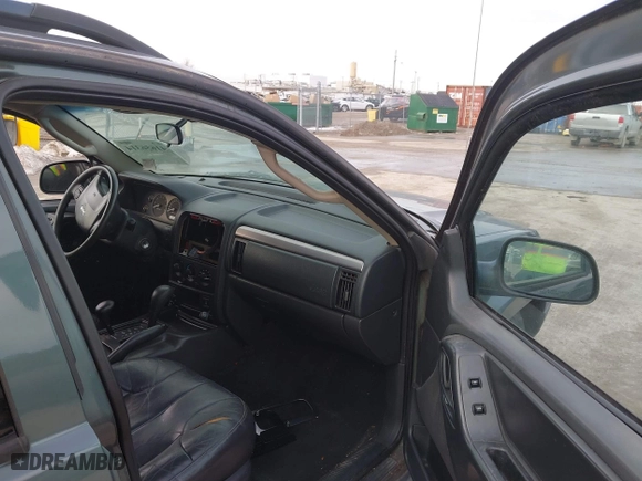 2003 Jeep Grand Cherokee Laredo with VIN 1J4GW48S93C583644, listed as a IAAI auction lot 41656314 with 256,653 mi miles. Bid and sale history available at carsss.com. Image 5.