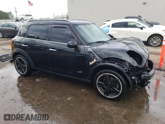 2012 MINI Countryman S with VIN WMWZC5C53CWM11801, listed as a Copart auction lot 43508965 with 101,751 mi miles and Salvage Title. Bid and sale history available at DreamBid. Image 4.