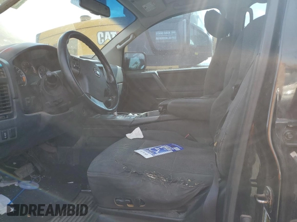 2012 Nissan Titan SV with VIN 1N6BA0ED3CN305384, listed as a Copart auction lot 56497905 with 331,174 mi miles and Salvage title. Bid and sale history available at DreamBid. Image 7.