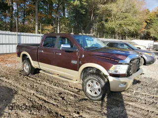 2012 Ram 2500 Laramie Longhorn with VIN 3C6UD5GL3CG291037, listed as a Copart auction lot 78585174 with 107,018 mi miles and Salvage Title. Bid and sale history available at carsss.com. Image 4.