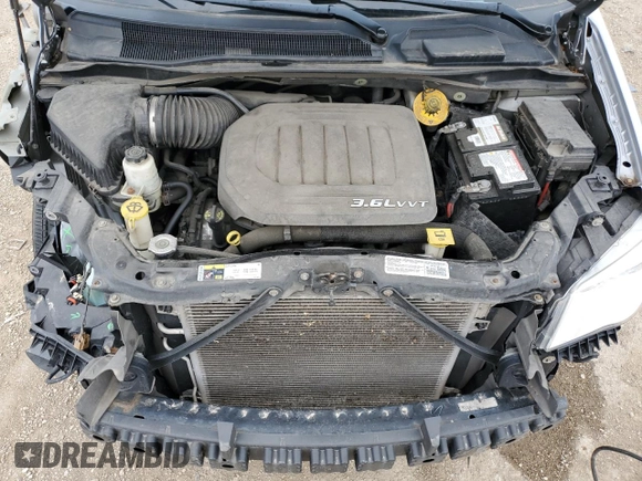 2014 Chrysler Town & Country Touring with VIN 2C4RC1BG1ER225720, listed as a Copart auction lot 58071165 with 104,502 mi miles and Salvage title. Bid and sale history available at DreamBid. Image 12.