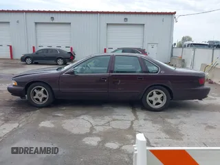 1995 Chevrolet Caprice z VIN 1G1BL52PXSR184877, wystawiony jako IAAI lot #42105547 z przebiegiem 109 845 mil mil oraz . Historia ofert i sprzedaży dostępna na DreamBid. Obrazek 15.