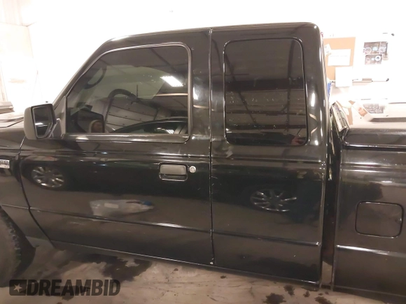2009 Ford Ranger XLT with VIN 1FTZR45E79PA63934, listed as a IAAI auction lot 41441326 with 153,140 mi miles. Bid and sale history available at carsss.com. Image 15.