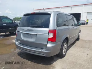 2016 Chrysler Town & Country Touring with VIN 2C4RC1BG4GR193462, listed as a IAAI auction lot 42200990 with 140,430 mi miles. Bid and sale history available at carsss.com. Image 4.