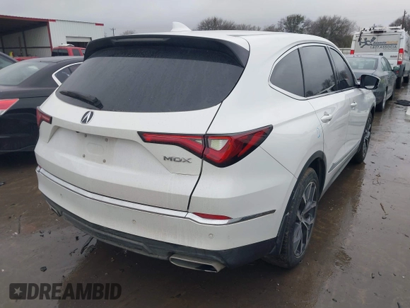 2022 Acura MDX Technology with VIN 5J8YD9H42NL011575, listed as a IAAI auction lot 41459325 with 40,017 mi miles and . Bid and sale history available at DreamBid. Image 4.
