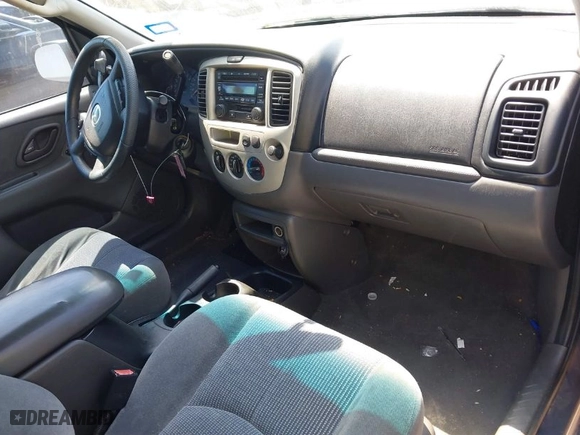 2003 Mazda Tribute LX with VIN 4F2CZ04133KM23234, listed as a IAAI auction lot 41869955 with 240,898 mi miles. Bid and sale history available at carsss.com. Image 5.