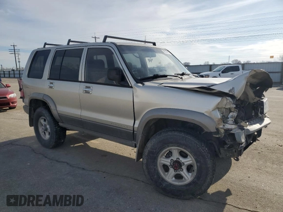 2001 Isuzu Trooper S with VIN JACDJ58X117J11550, listed as a Copart auction lot 46323185 with 236,762 mi miles and Salvage title. Bid and sale history available at DreamBid. Image 4.