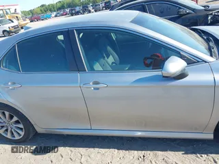 2019 Toyota Camry LE z VIN 4T1B11HK7KU756675, wystawiony jako IAAI lot #42063923 z przebiegiem 132 312 mil mil oraz . Historia ofert i sprzedaży dostępna na DreamBid. Obrazek 13.