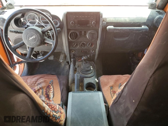 2010 Jeep Wrangler Rubicon with VIN 1J4BA6D12AL186887, listed as a Copart auction lot 57902545 with Not provided miles and Salvage title. Bid and sale history available at DreamBid. Image 8.