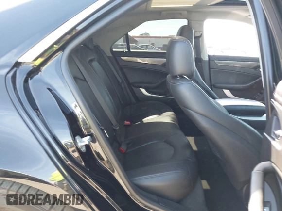 2012 Cadillac CTS Performance z VIN 1G6DJ5E30C0156576, wystawiony jako IAAI lot #42287858 z przebiegiem 106 497 mil mil oraz . Historia ofert i sprzedaży dostępna na DreamBid. Obrazek 8.
