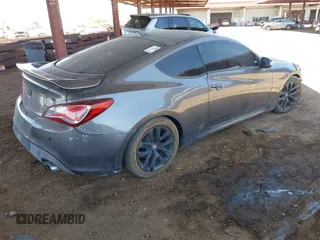 2013 Hyundai Genesis Coupe R-Spec with VIN KMHHU6KJ8DU079718, listed as a IAAI auction lot 42603184 with 105,660 mi miles and . Bid and sale history available at DreamBid. Image 4.