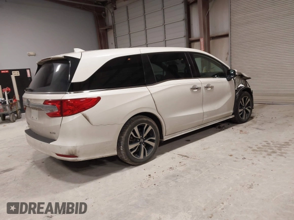 2018 Honda Odyssey Elite with VIN 5FNRL6H94JB034739, listed as a IAAI auction lot 41242506 with 96,982 mi miles and . Bid and sale history available at DreamBid. Image 4.