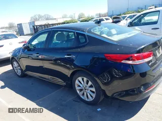 2016 Kia Optima LX with VIN 5XXGT4L3XGG013835, listed as a IAAI auction lot 41815349 with 120,628 mi miles and . Bid and sale history available at carsss.com. Image 14.