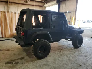 2006 Jeep Wrangler SE with VIN 1J4FA29126P705827, listed as a Copart auction lot 82226674 with 165,632 mi miles and Salvage Title. Bid and sale history available at carsss.com. Image 3.
