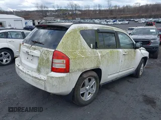 2010 Jeep Compass Sport with VIN 1J4NF4FB3AD510495, listed as a IAAI auction lot 41841332 with 148,681 mi miles. Bid and sale history available at carsss.com. Image 4.