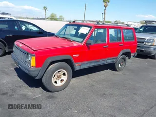 1996 Jeep Cherokee Sport with VIN 1J4FT68S0TL225719, listed as a IAAI auction lot 42121351 with 237,602 mi miles and . Bid and sale history available at DreamBid. Image 2.