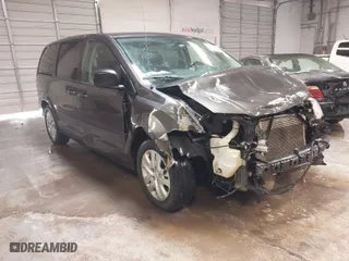 2016 Dodge Grand Caravan American Value Pkg with VIN 2C4RDGBG2GR172299, listed as a IAAI auction lot 41569731 with 196,973 mi miles. Bid and sale history available at carsss.com. Image 1.