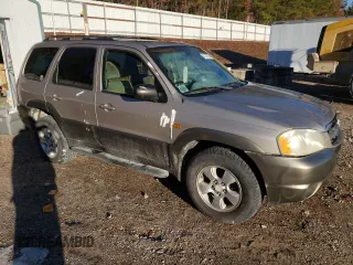2002 Mazda Tribute LX with VIN 4F2CU08172KM40111, listed as a Copart auction lot 47141754 with 131,324 mi miles and Non Repairable. Bid and sale history available at carsss.com. Image 4.