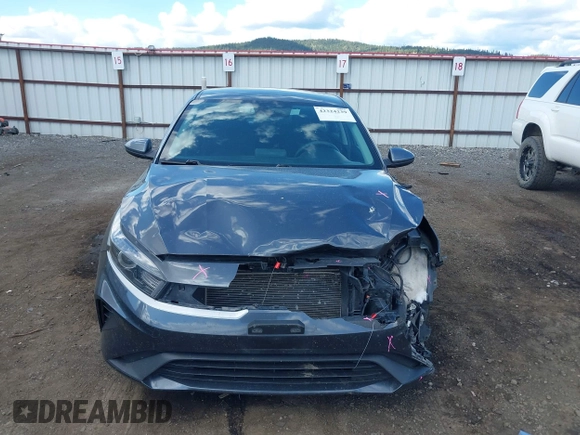 2022 Kia Forte LXS z VIN 3KPF24AD2NE455301, wystawiony jako IAAI lot #42324239 z przebiegiem 56 078 mil mil oraz . Historia ofert i sprzedaży dostępna na DreamBid. Obrazek 13.