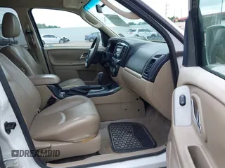 2006 Mazda Tribute i with VIN 4F2YZ02Z56KM31953, listed as a IAAI auction lot 42167223 with 185,169 mi miles and . Bid and sale history available at carsss.com. Image 5.