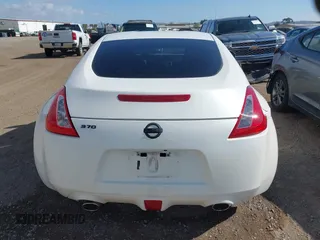 2016 Nissan 370Z Sport z VIN JN1AZ4EH9GM931683, wystawiony jako IAAI lot #42000779 z przebiegiem 113 919 mil mil oraz . Historia ofert i sprzedaży dostępna na DreamBid. Obrazek 16.