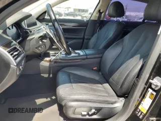 2018 BMW 7 Series 740i xDrive with VIN WBA7E4C57JGV23763, listed as a Copart auction lot 67151864 with 173,803 mi miles and Clean Title. Bid and sale history available at carsss.com. Image 7.