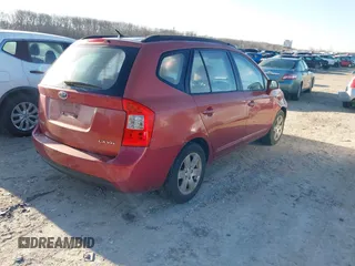2008 Kia Rondo LX with VIN KNAFG526587147323, listed as a IAAI auction lot 41550909 with 150,967 mi miles. Bid and sale history available at carsss.com. Image 4.