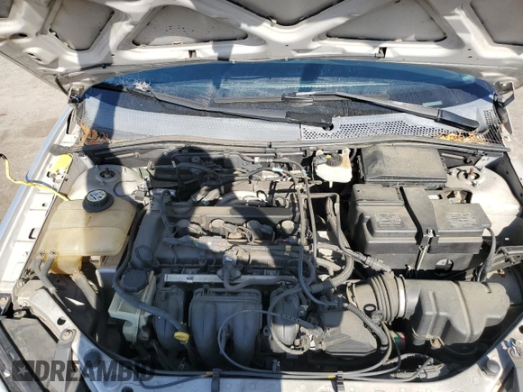 2007 Ford Focus S z VIN 1FAFP34N97W264411, wystawiony jako Copart lot #53251655 z przebiegiem 159 516 mil mil oraz Szkoda całkowita • Salvage title. Historia ofert i sprzedaży dostępna na DreamBid. Obrazek 11.