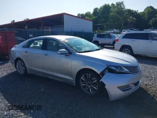2013 Lincoln MKZ z VIN 3LN6L2GK5DR810147, wystawiony jako IAAI lot #40102072 z przebiegiem 133 690 mil mil oraz . Historia ofert i sprzedaży dostępna na DreamBid. Obrazek 1.