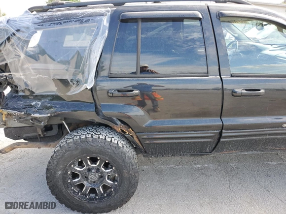 2004 Jeep Grand Cherokee Limited with VIN 1J8GW58S84C387426, listed as a Copart auction lot 66891784 with 0 mi miles and Salvage Title. Bid and sale history available at carsss.com. Image 12.